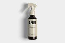 Single AEON ceramic coating bottle with shadow casting against white background
