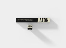 Professional AEON protection film boxes showing minimalist black and white design