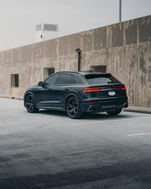 Side profile of an Audi featuring AEON Satin Paint Protection Film, emphasizing the durable and stylish satin finish.